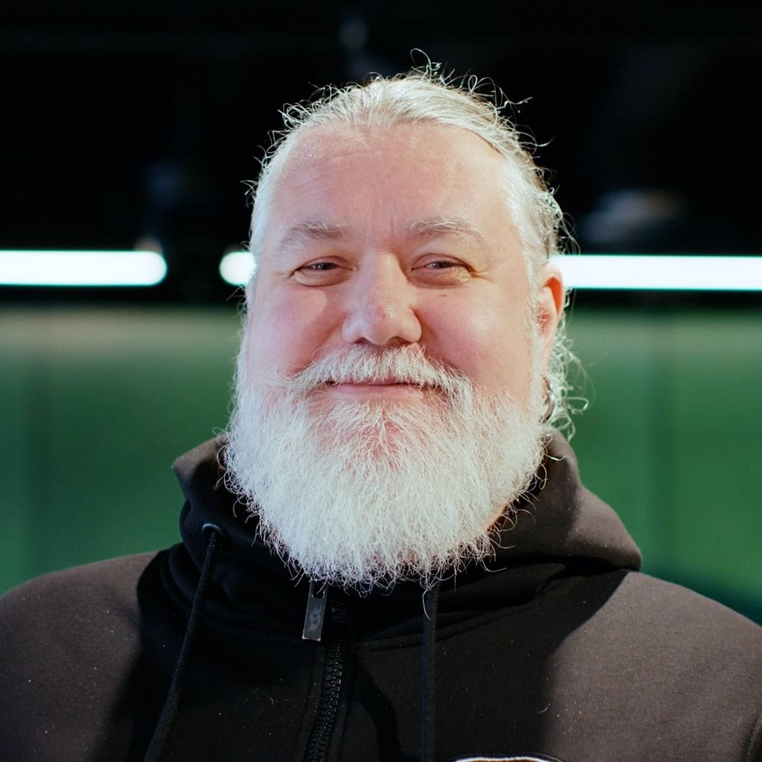 Person sitting in a chair with a laptop