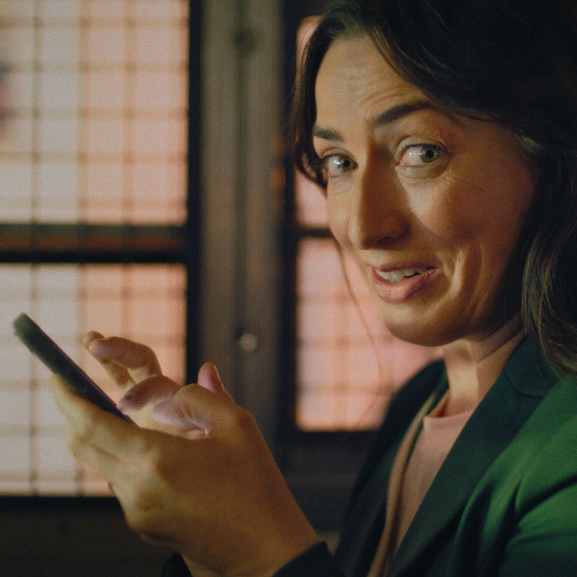 A person looking very surprised and amused while playing Merge Mansion